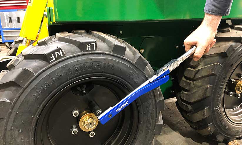 Checking Tire pressure on a Kanga Loader